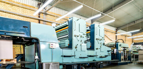 Press printing printshop Offset machine. Offset press is a printing machine designed to produce...