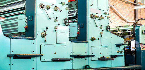Press printing printshop Offset machine. Offset press is a printing machine designed to produce...