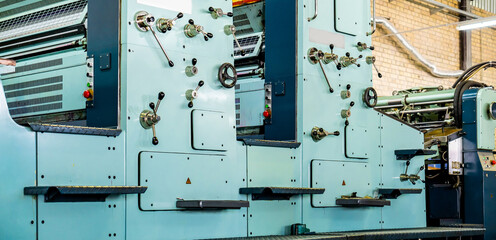 Press printing printshop Offset machine. Offset press is a printing machine designed to produce...