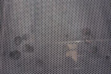 metallic texture with circle pattern.