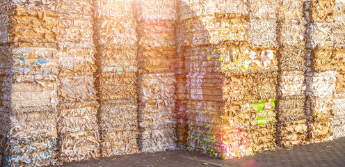 Bales of cardboard and box board with strapping wire ties