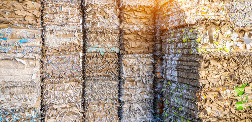 Bales of cardboard and box board with strapping wire ties