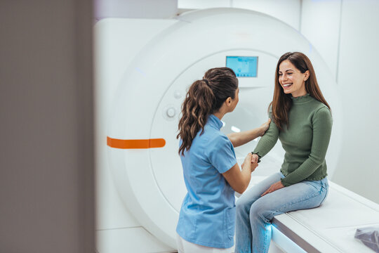 Healthcare Professional Assisting Patient During MRI Scan Checkup Session