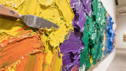 Painting depicts colorful thick brushstrokes. Impasto artwork showcases vivid textures layering. Art design illustration background creative projects. Bright multiple colors rough texture image
