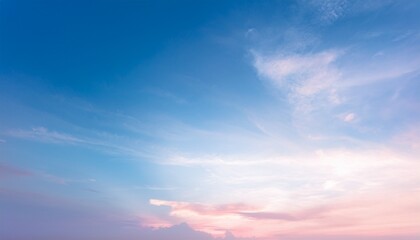 Fototapeta premium a soft pastel sky with a blend of white light blue and pink creating a dreamy and ethereal atmosphere