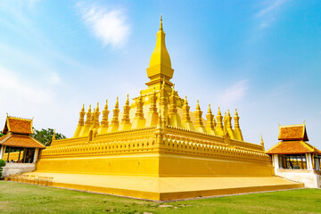 Pha that luang shining under blue sky in vientiane, laos