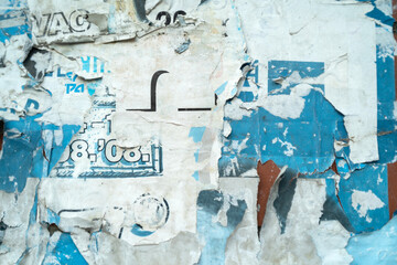 Art collage of a ripped and torn street poster background