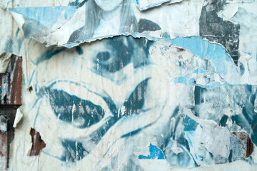 Art collage of a ripped and torn street poster background