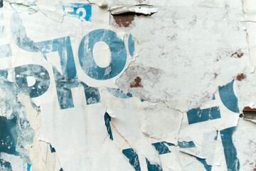 Art collage of a ripped and torn street poster background