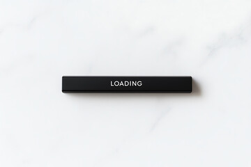 A sleek black bar with the word "LOADING" in white text, isolated on a textured white marble background. Minimalist design symbolizes digital progress.
