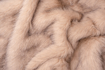 Texture of faux fur as a background, top view.