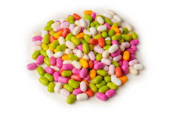 Sweet multicolored candies isolated on white background.