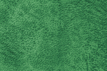Detailed close up, macro of green synthetic suede leather texture, faux leather, leatherette....