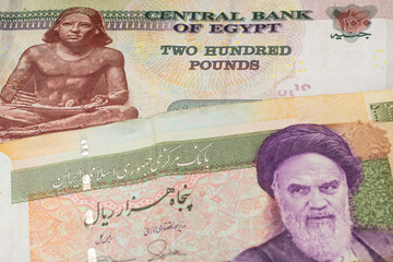 200 Egyptian pound and 50000 Iranian rial banknotes. International trade concept