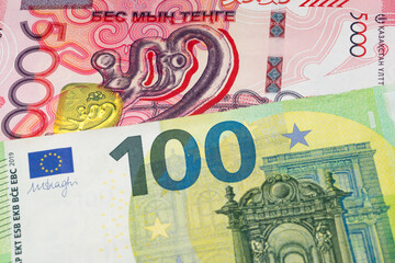 5000 Kazakhstani tenge and 100 euro banknotes. International trade concept