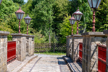 Tramlines over historical stone bridge