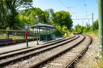 Waiting room shelter beside the tramlines. Captured on a bright and sunny day