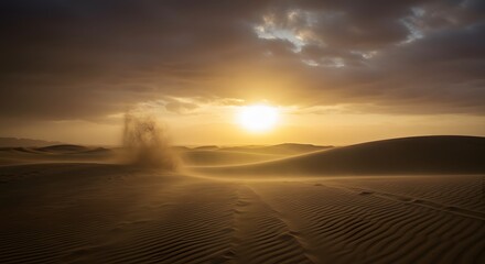 Desert landscape with sand dunes and dramatic sky at sunset or sunrise.