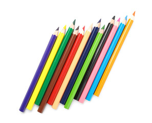 Many colorful pencils on white background