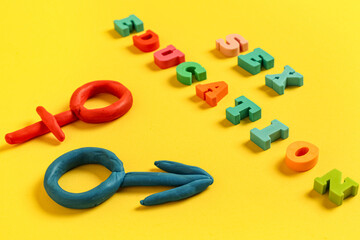 Colorful letters with text SEX EDUCATION, male and female symbols on yellow background