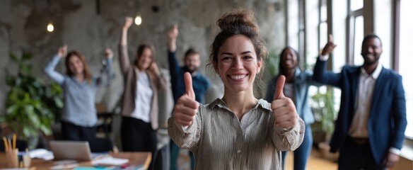 The cheerful woman leading a successful and supportive team in the office.