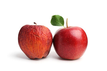 Rotten apple and fresh one isolated on white