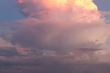 Serene Sunset Sky with Colorful Clouds and Soft Pastel Hues Over a Tranquil Horizon Capturing the Beauty of Nature's Evening Canvas at Dusk
