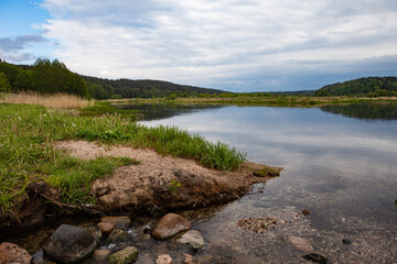 Tranquil Nemunas River Bend with Grassy Banks and Forests, Lithuania
