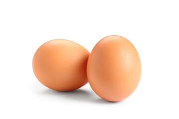 Brown chicken eggs on white background