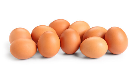 Many brown chicken eggs on white background