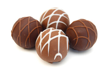 Chocolate candies collection. Beautiful Belgian truffles isolated on white background