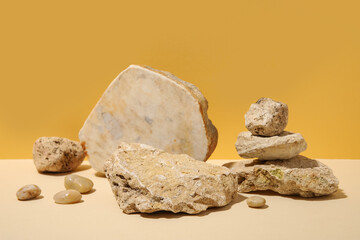 Different sea stones on colorful background