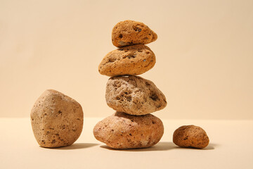 Many sea stones on beige background