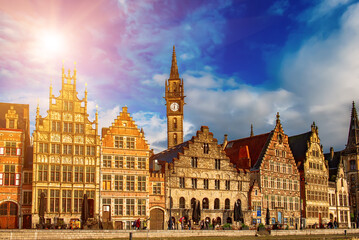 Fototapeta premium Ghent city historical center, tourists boats and colorful buildings on Leie river bank, Belgium