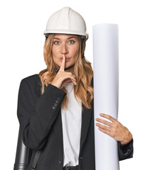 Blonde architect with plans in studio keeping a secret or asking for silence.