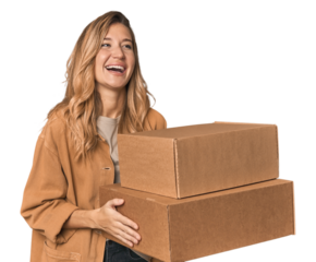Cheerful blonde with cardboard boxes moving day