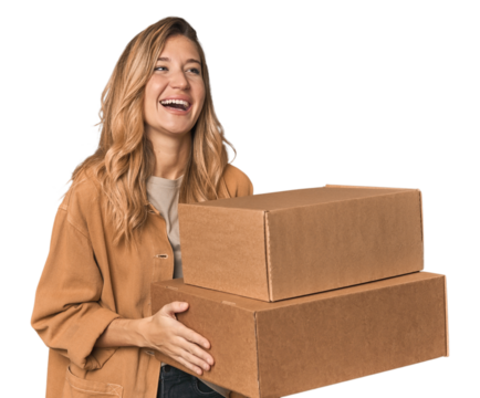 Cheerful blonde with cardboard boxes moving day
