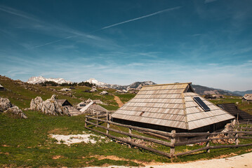 Mountain village in Alps, wooden houses in traditional style, Velika Planina, Kamnik, Slovenia