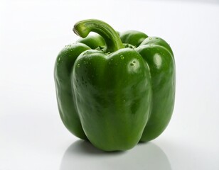 A green bell pepper on a white backdrop.