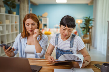 multicultural female friends discussing and working or teaching at home