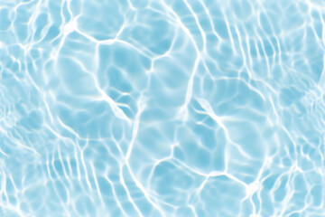 Blue water with ripples on the surface. Defocus blurred transparent blue colored clear calm water...