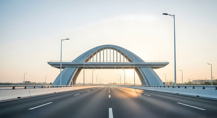 Obraz premium Futuristic Bridge Design Over Asphalt Road at Sunrise Modern Transportation Scene