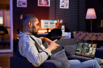 Freelancer joining a teleconference call for remote workshop lesson, maintaining a strong digital...