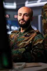 Air force combat control officer performing tactical level surveillance and reconnaissance using...