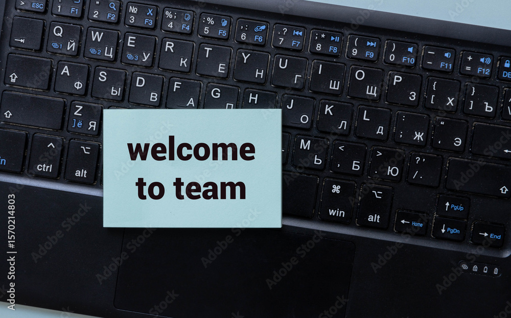 Poster welcome to team text concept write on notebook.