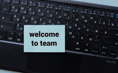 WELCOME TO TEAM text concept write on notebook.