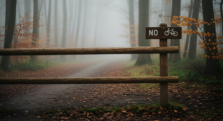 Mystical Autumn Forest Path Blocked by No Bicycles Allowed Barrier
