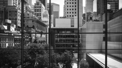 City skyline buildings, a window view in Manhattan, NYC, Black and white photo