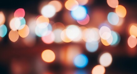 Night City Lights Bokeh: Abstract bokeh lights in a vibrant array of warm and cool colors create a mesmerizing visual effect, suggesting a bustling cityscape at night. 