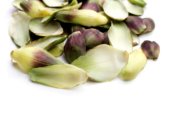 Artichoke petals on white background.
